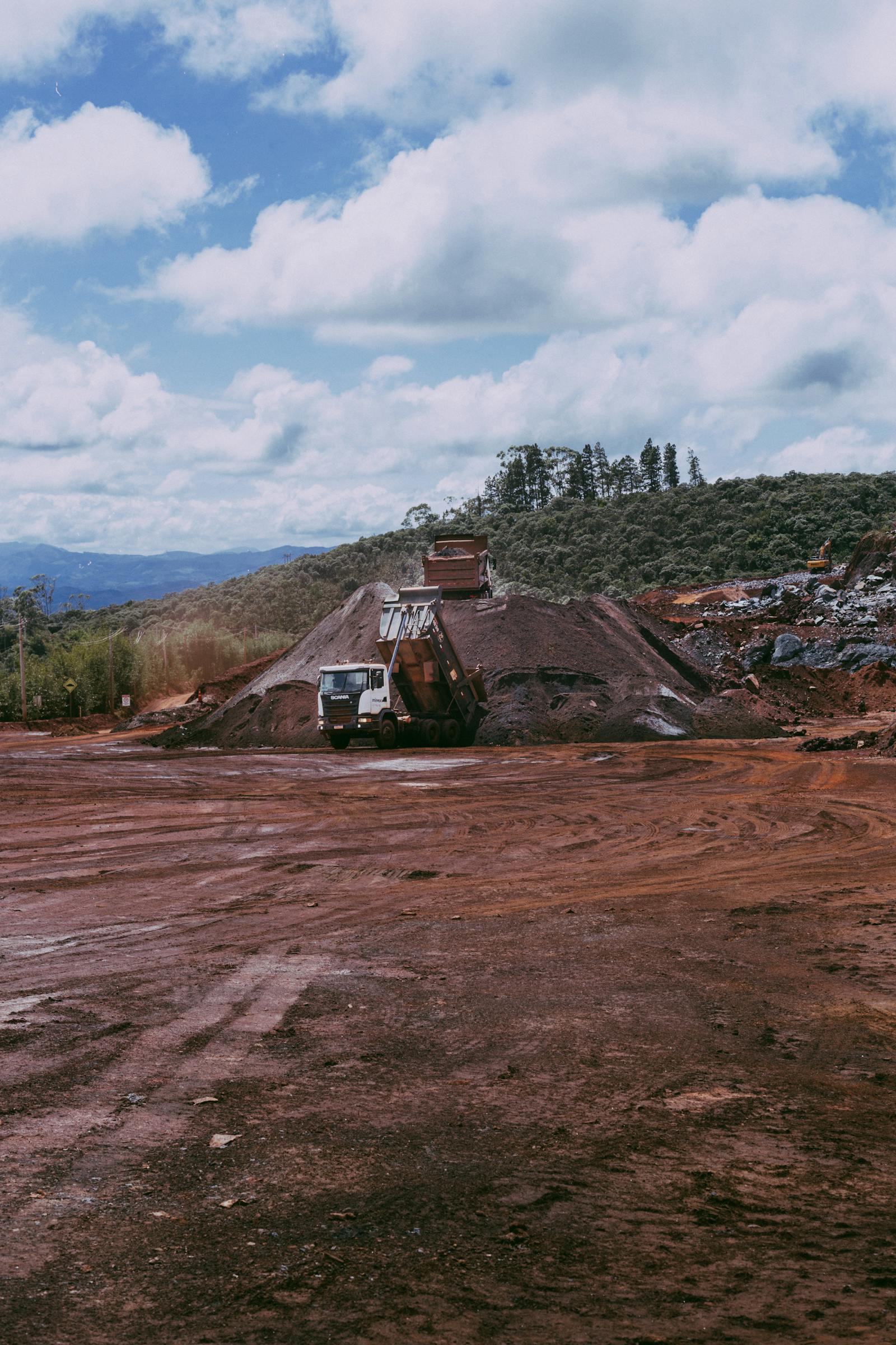 Open-pit mining and truck movement used for Tanzania-origin coal cargoes